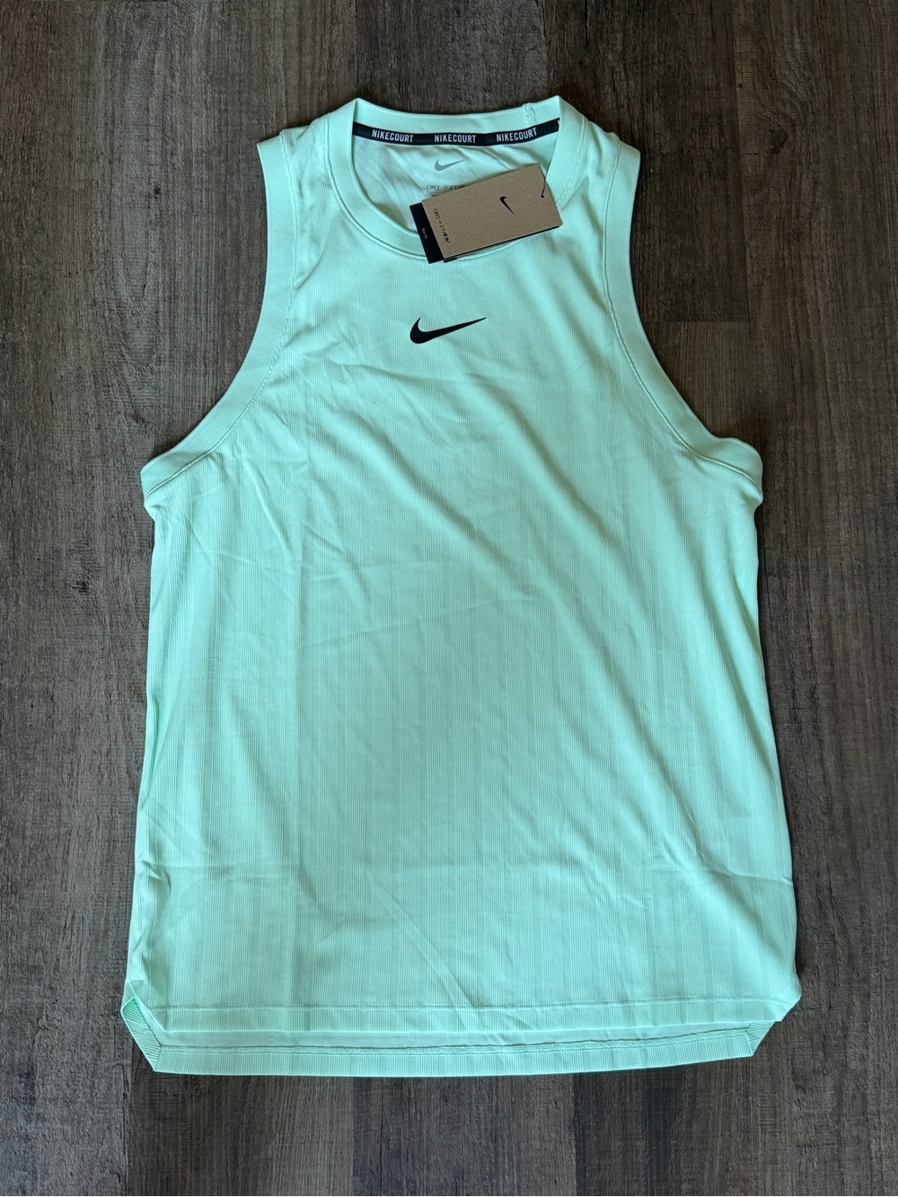 Nike Court Dri-FIT ADV Tennis Tank Top.
- Size S Men.
